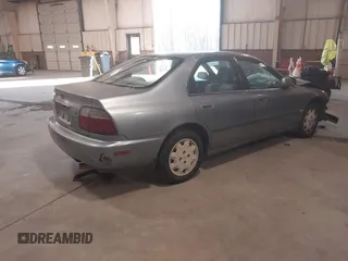 1996 Honda Accord LX with VIN 1HGCD563XTA141867, listed as a IAAI auction lot 41015252 with 420,800 mi miles and . Bid and sale history available at carsss.com. Image 4.