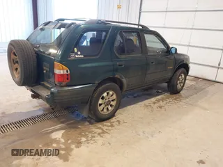 2000 Honda Passport LX z VIN 4S6DM58W1Y4406601, wystawiony jako IAAI lot #41632864 z przebiegiem 195 791 mil mil oraz . Historia ofert i sprzedaży dostępna na DreamBid. Obrazek 4.