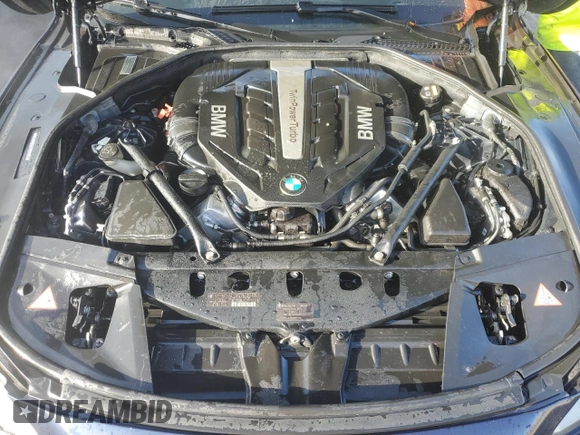 2015 BMW 7 Series 750Li xDrive with VIN WBAYF8C58FD654184, listed as a Copart auction lot 77203184 with 122,955 mi miles and Non Repairable. Bid and sale history available at DreamBid. Image 11.