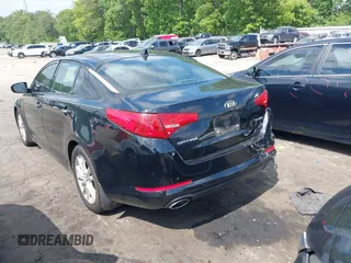 2013 Kia Optima EX z VIN 5XXGN4A71DG184078, wystawiony jako IAAI lot #42124359 z przebiegiem 196 389 mil mil oraz . Historia ofert i sprzedaży dostępna na DreamBid. Obrazek 3.