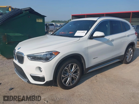 2016 BMW X1 xDrive28i z VIN WBXHT3Z37G4A48242, wystawiony jako IAAI lot #42473404 z przebiegiem 34 309 mil mil oraz . Historia ofert i sprzedaży dostępna na DreamBid. Obrazek 2.