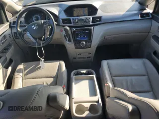 2014 Honda Odyssey Touring with VIN 5FNRL5H94EB116891, listed as a Copart auction lot 61400725 with 202,972 mi miles and Salvage title. Bid and sale history available at DreamBid. Image 8.