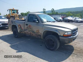 2002 Dodge Dakota z VIN 1B7GG16X72S525603, wystawiony jako IAAI lot #42417722 z przebiegiem 150 867 mil mil oraz . Historia ofert i sprzedaży dostępna na DreamBid. Obrazek 1.