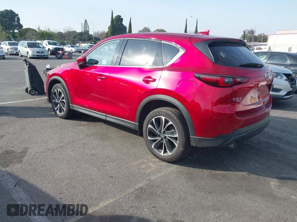 2023 Mazda CX-5 S Premium with VIN JM3KFBDM2P0130525, listed as a IAAI auction lot 41479518 with 18,145 mi miles and . Bid and sale history available at DreamBid. Image 3.