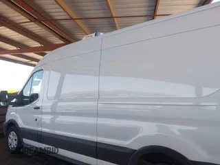 2020 Ford Transit Cargo with VIN 1FTBR1C8XLKB20144, listed as a IAAI auction lot 42141037 with 87,147 mi miles and . Bid and sale history available at carsss.com. Image 14.