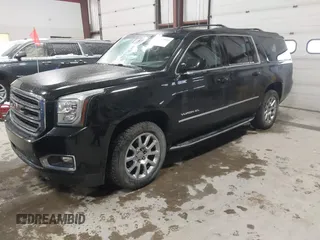 2015 GMC Yukon XL SLT with VIN 1GKS2HKC9FR175011, listed as a IAAI auction lot 41510519 with 194,136 mi miles. Bid and sale history available at carsss.com. Image 2.