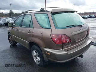 1999 Lexus RX 300 Luxury SUV with VIN JT6HF10U5X0061520, listed as a IAAI auction lot 41612890 with 254,864 mi miles. Bid and sale history available at carsss.com. Image 3.