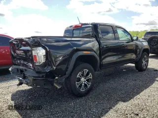 2023 GMC Canyon 4WD AT4 with VIN 1GTP6DEK9P1151776, listed as a Copart auction lot 52977805 with 11,750 mi miles and Salvage Title. Bid and sale history available at carsss.com. Image 3.