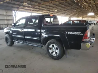 2015 Toyota Tacoma z VIN 3TMLU4EN9FM192716, wystawiony jako Copart lot #61462045 z przebiegiem 103 240 mil mil oraz Szkoda całkowita • Salvage title. Historia ofert i sprzedaży dostępna na DreamBid. Obrazek 2.
