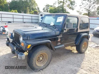 2000 Jeep Wrangler Sahara with VIN 1J4FA59SXYP718029, listed as a IAAI auction lot 42583372 with 260,811 mi miles and . Bid and sale history available at DreamBid. Image 17.