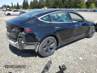 2020 Tesla Model 3 Long Range z VIN 5YJ3E1EBXLF795689, wystawiony jako Copart lot #56703555 z przebiegiem 62 556 mil mil oraz Szkoda całkowita • Salvage title. Historia ofert i sprzedaży dostępna na DreamBid. Obrazek 3.