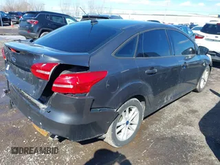 2018 Ford Focus SE with VIN 1FADP3F23JL268442, listed as a IAAI auction lot 41662347 with 66,653 mi miles and . Bid and sale history available at carsss.com. Image 4.