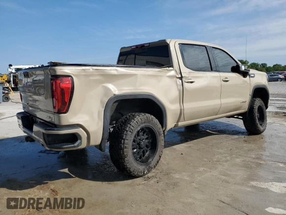 2023 GMC Sierra 1500 AT4 with VIN 1GTUUEE89PZ218574, listed as a Copart auction lot 55883305 with 34,239 mi miles and Salvage title. Bid and sale history available at DreamBid. Image 3.