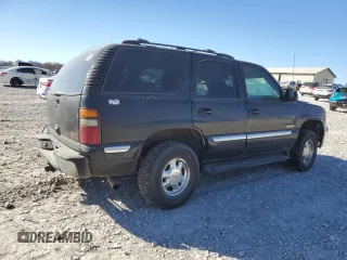 2000 GMC Yukon SLE with VIN 1GKEK13T3YJ107596, listed as a Copart auction lot 83326244 with 293,602 mi miles and Salvage Title. Bid and sale history available at carsss.com. Image 3.