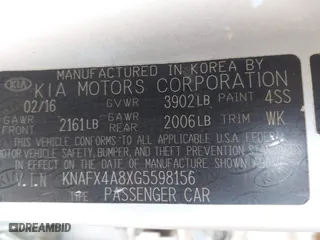 2016 Kia Forte EX with VIN KNAFX4A8XG5598156, listed as a IAAI auction lot 41980015 with 114,672 mi miles. Bid and sale history available at carsss.com. Image 9.