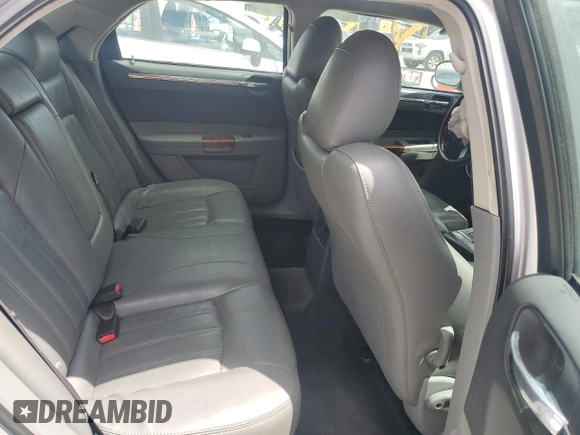 2005 Chrysler 300 with VIN 2C3AA63H95H591782, listed as a Copart auction lot 68888294 with 192,568 mi miles and Salvage Title. Bid and sale history available at carsss.com. Image 10.