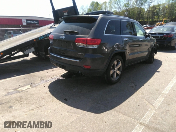 2014 Jeep Grand Cherokee Limited with VIN 1C4RJEBG7EC482872, listed as a IAAI auction lot 41991274 with 125,343 mi miles and . Bid and sale history available at DreamBid. Image 4.