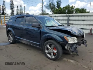 2013 Dodge Journey SE with VIN 3C4PDCAB7DT680055, listed as a Copart auction lot 58241435 with 199,620 mi miles and Salvage title. Bid and sale history available at DreamBid. Image 4.