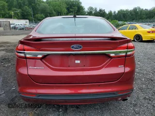 2017 Ford Fusion SE with VIN 3FA6P0H74HR197800, listed as a Copart auction lot 61042735 with 128,125 mi miles and Salvage title. Bid and sale history available at DreamBid. Image 6.