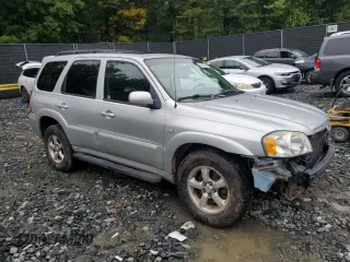 2005 Mazda Tribute LX with VIN 4F2YZ94185KM47932, listed as a Copart auction lot 63587744 with 203,178 mi miles and Salvage Title. Bid and sale history available at carsss.com. Image 4.