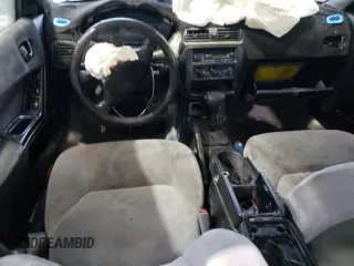 2003 Mitsubishi Galant ES z VIN 4A3AA46H93E144513, wystawiony jako Copart lot #84241744 z przebiegiem 99 849 mil mil oraz Szkoda całkowita • Salvage title. Historia ofert i sprzedaży dostępna na DreamBid. Obrazek 8.