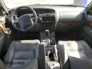 1999 Isuzu Trooper S с VIN JACDJ58X6X7928036, выставлен на аукционе Copart как лот 47035495 с пробегом 181 558 миль миль и Списание • Salvage title. История ставок и продаж доступна на DreamBid. Изображение 8.