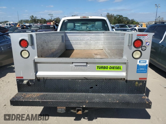 2012 Ford F-250 XL with VIN 1FDBF2A67CEC73025, listed as a Copart auction lot 75308984 with 107,018 mi miles and Salvage title. Bid and sale history available at DreamBid. Image 6.