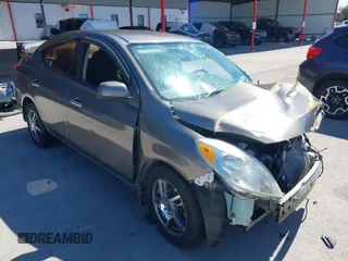 2014 Nissan Versa SV with VIN 3N1CN7AP0EL825097, listed as a IAAI auction lot 41734234 with 75,718 mi miles. Bid and sale history available at carsss.com. Image 1.
