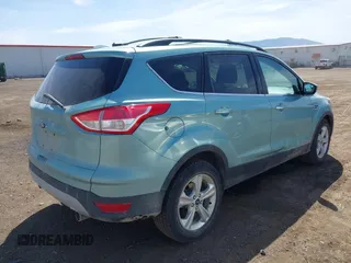 2013 Ford Escape SE with VIN 1FMCU9GX0DUC79114, listed as a IAAI auction lot 42237118 with 176,413 mi miles and . Bid and sale history available at DreamBid. Image 4.