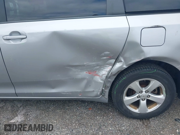 2013 Toyota Sienna LE AAS with VIN 5TDKK3DC3DS402574, listed as a IAAI auction lot 42272047 with 142,938 mi miles and . Bid and sale history available at DreamBid. Image 6.