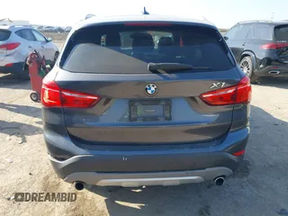 2016 BMW X1 xDrive28i with VIN WBXHT3Z35G4A49941, listed as a IAAI auction lot 41789774 with 111,661 mi miles and . Bid and sale history available at DreamBid. Image 16.
