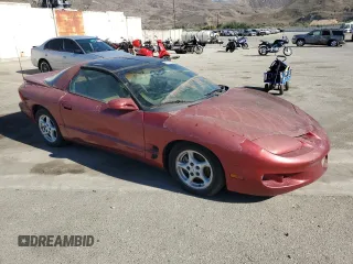 1998 Pontiac Firebird Firebird z VIN 2G2FS22K6W2202173, wystawiony jako Copart lot #77708594 z przebiegiem Nie podano mil oraz Czysty tytuł • Clean title. Historia ofert i sprzedaży dostępna na DreamBid. Obrazek 4.