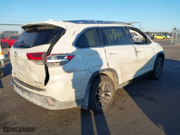 2019 Toyota Highlander SE with VIN 5TDJZRFH2KS566656, listed as a IAAI auction lot 41279310 with 103,172 mi miles. Bid and sale history available at carsss.com. Image 4.