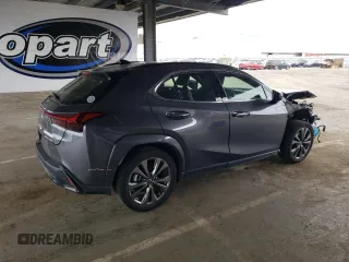 2023 Lexus UX 250h F Sport with VIN JTHB9JBHXP2065586, listed as a Copart auction lot 59037755 with 23,620 mi miles and Salvage title. Bid and sale history available at DreamBid. Image 3.