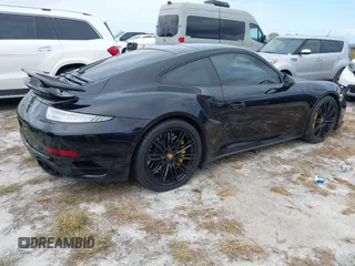2014 Porsche 911 Turbo S with VIN WP0AD2A99ES167048, listed as a IAAI auction lot 40643041 with Not Provided miles. Bid and sale history available at carsss.com. Image 4.