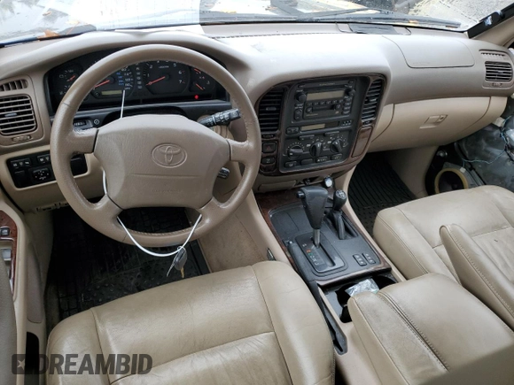 2000 Toyota Land Cruiser with VIN JT3HT05J7Y0084006, listed as a Copart auction lot 76390254 with 142,620 mi miles and Salvage Title. Bid and sale history available at carsss.com. Image 8.