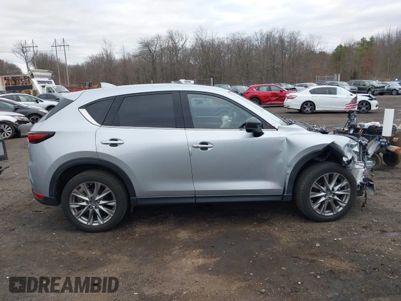 2020 Mazda CX-5 Grand Touring with VIN JM3KFBDM4L0843825, listed as a IAAI auction lot 41733575 with 18,800 mi miles. Bid and sale history available at carsss.com. Image 14.