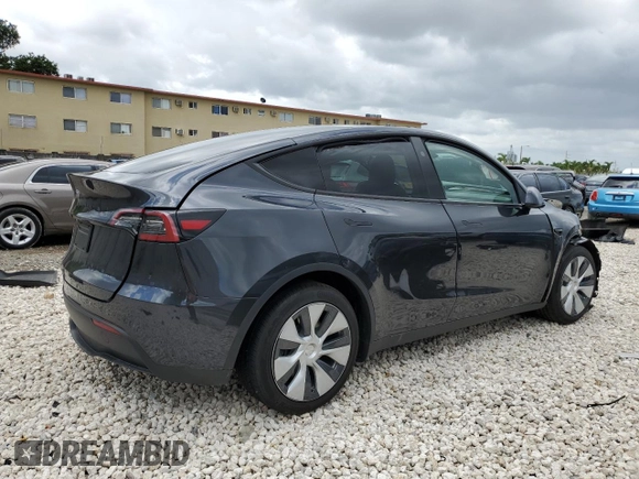 2024 Tesla Model Y with VIN 7SAYGDED2RF040079, listed as a Copart auction lot 57237054 with 2,549 mi miles and Non Repairable. Bid and sale history available at DreamBid. Image 3.