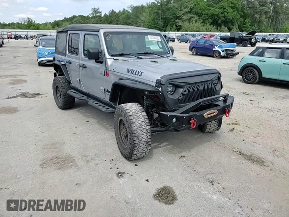 2020 Jeep Wrangler Unlimited Willys z VIN 1C4HJXDG5LW216718, wystawiony jako Copart lot #53144705 z przebiegiem 27 932 mil mil oraz Czysty tytuł • Clean title. Historia ofert i sprzedaży dostępna na DreamBid. Obrazek 14.