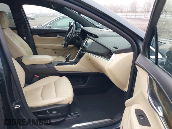 2019 Cadillac XT5 FWD with VIN 1GYKNARS5KZ220134, listed as a IAAI auction lot 41472927 with 58,229 mi miles and . Bid and sale history available at DreamBid. Image 5.