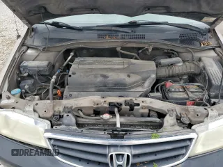 2003 Honda Odyssey EX z VIN 5FNRL186X3B152340, wystawiony jako Copart lot #57883455 z przebiegiem 214 008 mil mil oraz Szkoda całkowita • Salvage title. Historia ofert i sprzedaży dostępna na DreamBid. Obrazek 12.