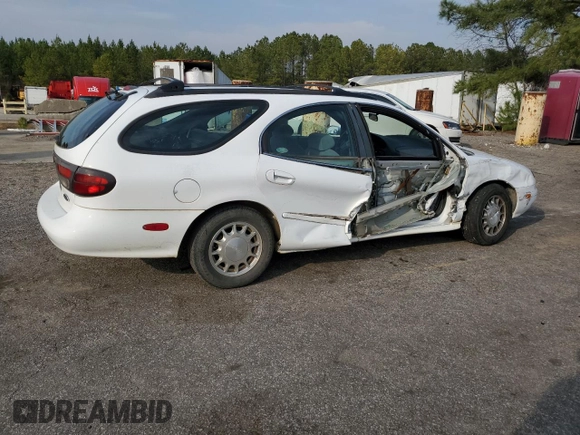 1999 Ford Taurus SE z VIN 1FAFP58S0XA272714, wystawiony jako Copart lot #48966215 z przebiegiem 255 885 mil mil oraz Szkoda całkowita • Salvage title. Historia ofert i sprzedaży dostępna na DreamBid. Obrazek 3.