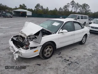 1999 Ford Taurus SE with VIN 1FAFP53S4XA185115, listed as a IAAI auction lot 41263216 with 182,770 mi miles. Bid and sale history available at carsss.com. Image 17.