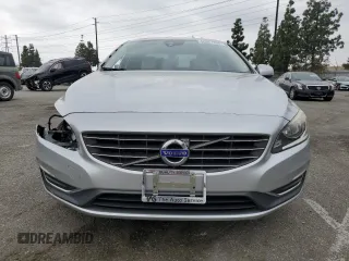 2014 Volvo S60 T5 with VIN YV1612FS4E1292856, listed as a Copart auction lot 50951795 with 121,283 mi miles and Salvage Title. Bid and sale history available at carsss.com. Image 5.