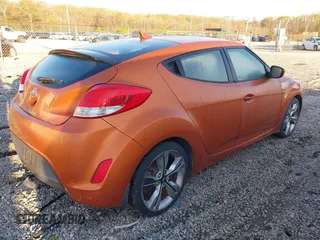 2012 Hyundai Veloster w/Black Int with VIN KMHTC6AD5CU044657, listed as a IAAI auction lot 41896892 with 115,846 mi miles and . Bid and sale history available at DreamBid. Image 4.