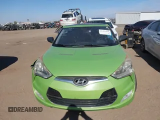 2012 Hyundai Veloster w/Gray Int z VIN KMHTC6AD5CU040673, wystawiony jako IAAI lot #41491429 z przebiegiem Nie podano mil oraz . Historia ofert i sprzedaży dostępna na DreamBid. Obrazek 11.