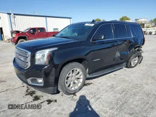 2016 GMC Yukon SLT with VIN 1GKS2BKC2GR251876, listed as a Copart auction lot 77204944 with 111,099 mi miles and Salvage Title. Bid and sale history available at carsss.com. Image 1.