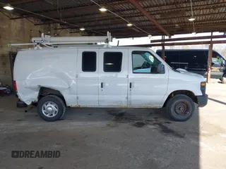 2012 Ford Econoline Cargo Commercial with VIN 1FTNE1EW3CDA31914, listed as a IAAI auction lot 41622154 with 99,254 mi miles and . Bid and sale history available at carsss.com. Image 13.