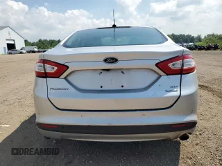 2016 Ford Fusion SE z VIN 3FA6P0HD0GR401822, wystawiony jako Copart lot #64350035 z przebiegiem 145 166 mil mil oraz Czysty tytuł • Clean title. Historia ofert i sprzedaży dostępna na DreamBid. Obrazek 6.