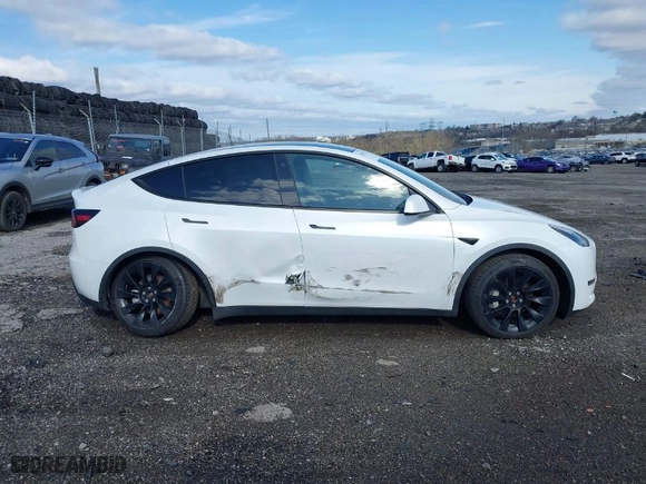 2023 Tesla Model Y Long Range with VIN 7SAYGDEE2PA059668, listed as a IAAI auction lot 41901079 with 58,276 mi miles. Bid and sale history available at carsss.com. Image 13.